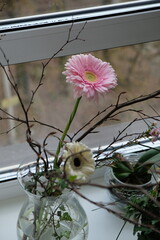bouquet of flowers on the window