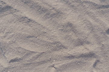 Surface of the sand beach. Sand beach pattern 