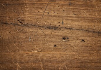 Detailed close-up of aged, textured wood surface with natural grain.