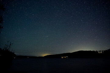 starry night sky over the lake