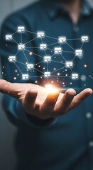Futuristic concept of digital connection and data flow with glowing network nodes held in an open hand