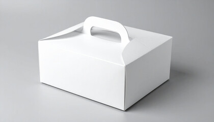 Cardboard white pastry box with handle isolated on gray surface, packaging template for cakes