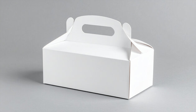 Cardboard white pastry box with handle isolated on gray surface, packaging template for cakes