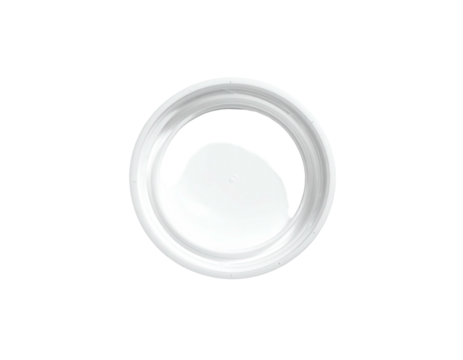 Circular white object with a curved indentation, set against a black backdrop