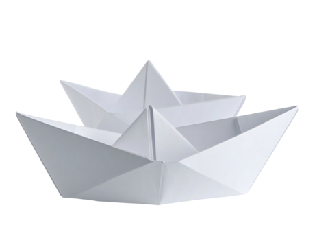 Two white origami boats, one nested partially within the other, against a black bg