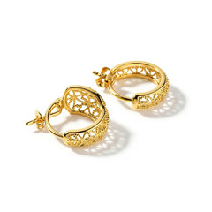Gold filigree hoop earrings on white background gold earrings