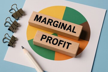 Marginal Profit displayed on wooden blocks atop a colorful pie chart, symbolizing crucial financial data analysis and business strategy planning
