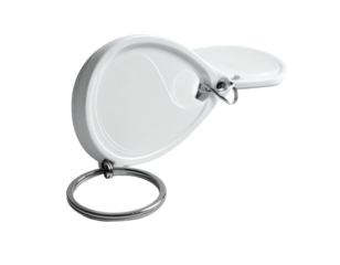 White oval-shaped key fob with a circular metal ring on a black background