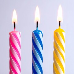 Three birthday candles burning brightly (1)