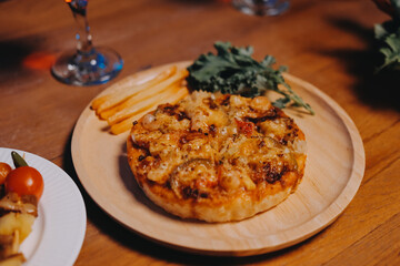 Joyful office Halloween party with coworkers in costumes, celebrating with drinks and laughter, fostering teamwork and festive spirit