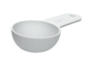Isolated white measuring cup, semi-spherical bowl, handle with a hole