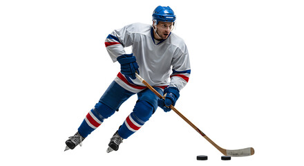 Fototapeta premium Ice hockey player in blue uniform skating and handling puck with stick on white background, perfect for sports and training content