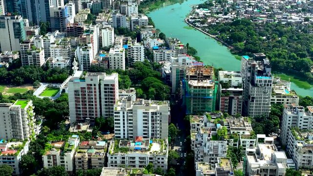 Highangle Aerial shot of a city with Beautiful lake surrounded by lush greenery  and dense buildings Gulshan, Dhaka, Bangladesh