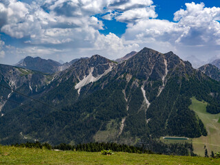 Majestic Panorama of the Dolomites Piercing Through the Clouds in Plan de Corones, Italy