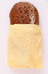 Freshly baked bread in a paper bag