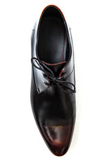 Elegant black leather dress shoe isolated on a white background.