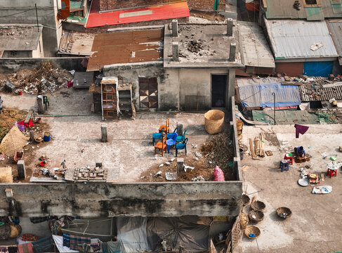 Aerial view of rooftops where daily life plays out amidst a tapestry of textures and tones, Dhaka, Dhaka Division, Bangladesh.