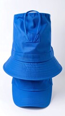 Two blue rain hats stacked