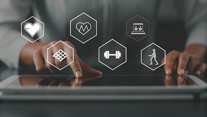 Tablet showing holographic fitness subscription monitoring