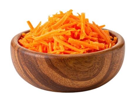 Close-up of grated orange vegetable in a wooden bowl against a dark background