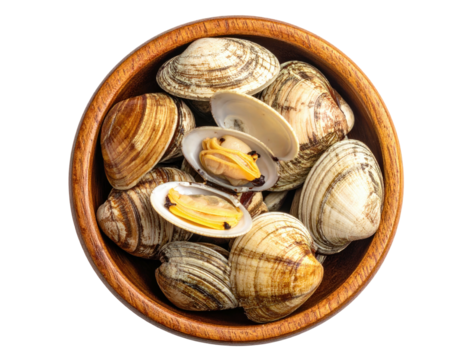 Overhead shot of raw clams in a wooden bowl, some shells open, over black