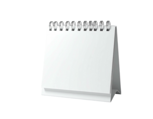 A blank, white desk calendar with spiral binding against a black backdrop