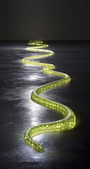 Winding yellow tube glows on dark, reflective floor