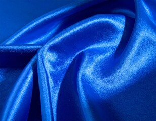 Lustrous royal blue satin fabric in soft folds