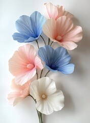 Pastel paper flowers with delicate textures
