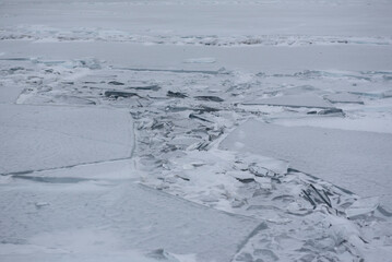 Close-up of shattered ice on frozen lake
