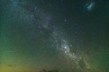 The busy night sky, milky way and meteor