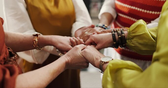 Group of women, holding hands and prayer circle for solidarity, faith and healing for religion, god or wellness. Community, mature people and support for hope, peace and worship together for love