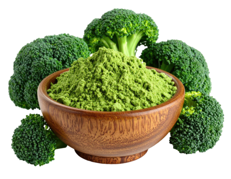 Fresh broccoli florets encircle a wooden bowl filled with green powder
