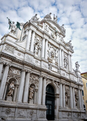Fototapeta premium Baroque church facade with statues in Venice Italy 