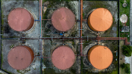 Aerial view white oil storage tank with pipeline steel, Crude oil industry, Storage fuel gas container tank petroleum refinery industrial factory, Oil storage chemical petrochemical refinery product.