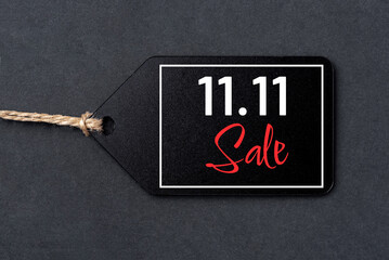 11.11 single day sale concept. Black tag on black background