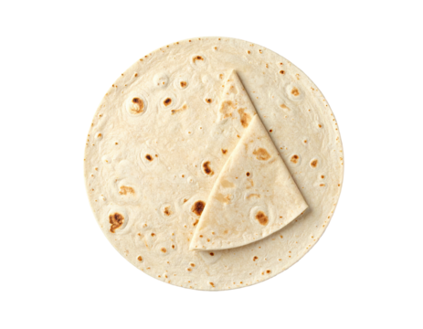 Overhead shot of a round tortilla with a folded, triangular slice