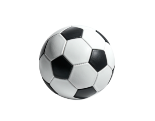 A classic black and white soccer ball isolated on a stark black background