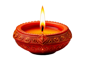 Traditional clay diya lamp with a warm flame isolated on a transparent or white background.