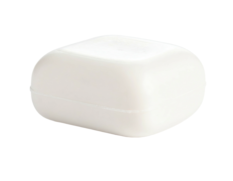 A close-up studio shot of a white, square soap bar with rounded edges