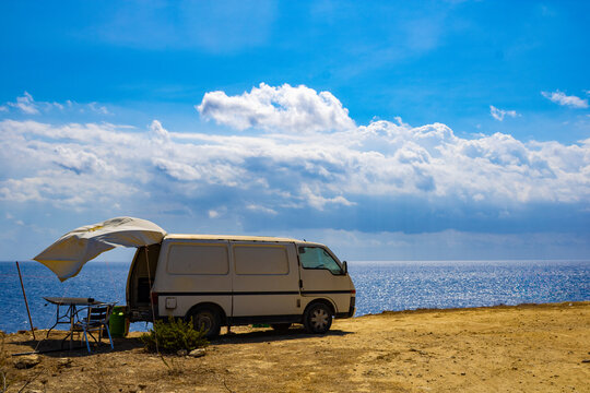 Camper van at Xatt l-Aħmar, Gozo, overlooking the Mediterranean Sea