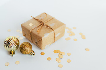 Christmas gift box and decorations on white background