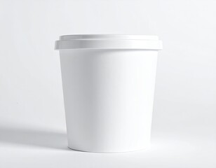 Plain white disposable cup with lid against white backdrop