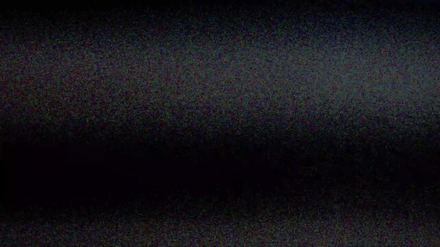 Authentic VHS tape noise with color bleeding, scan lines, and static glitch effects. Seamless loop for creating a retro 80s or 90s television look. Use as an overlay or background