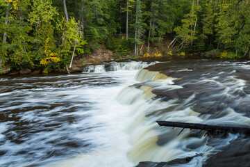 Lower Tahquamenon Falls - A beautiful waterfall scenic landscape in autumn.