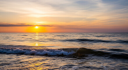 Obraz premium Golden Hour on the Ocean: Sun Reflected on Gentle Waves A mesmerizing seascape capturing a tranquil moment during sunrise or sunset (the golden hour) 