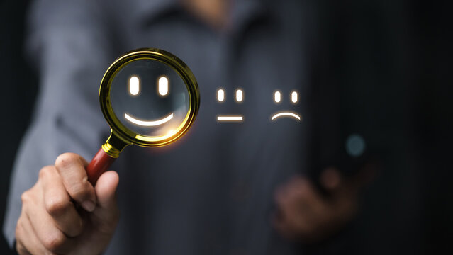 Customer Satisfaction Choice with Magnifying Glass and Smiley Face