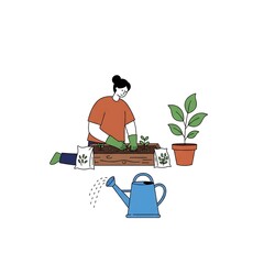 Gardening hobby planting seeds in a wooden box with watering can and plant.