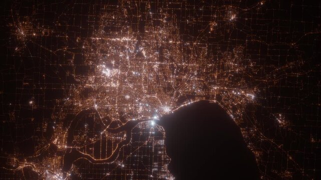 Buffalo (New York, USA) aerial view at night. Top view on modern city with street lights. Camera is zooming out, rotating clockwise. Vertical video. The north is on the left side