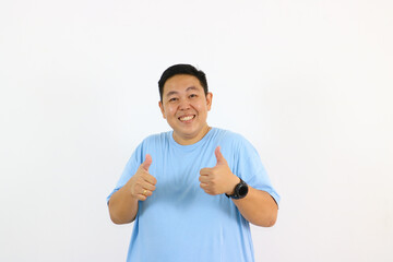 Excited man giving double thumbs up to camera